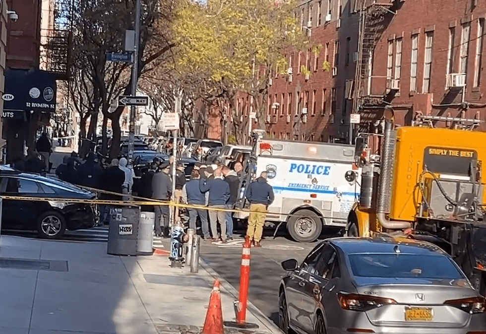 An armed man barricaded himself in a LES apartment building Thursday after officers attempted to arrest him.