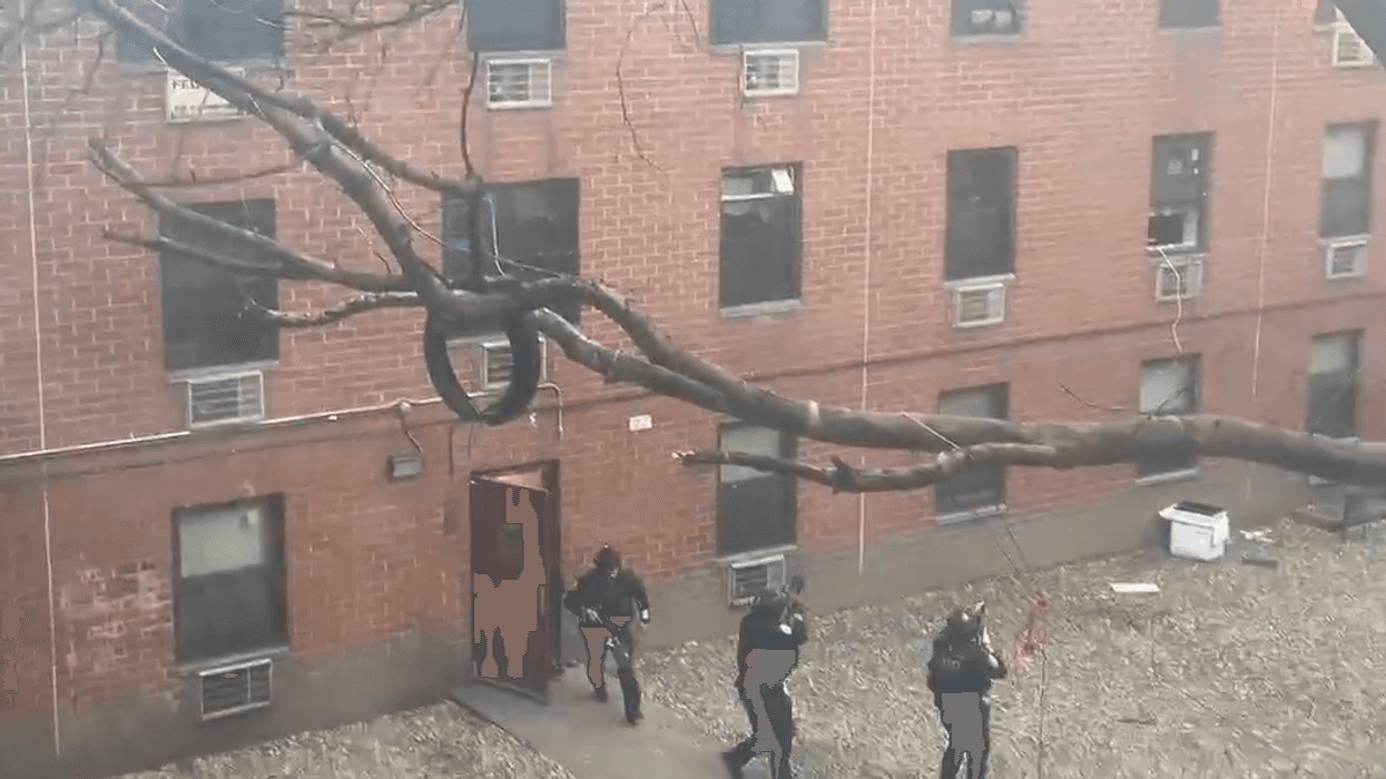 An armed man barricaded himself in a LES apartment building Thursday after officers attempted to arrest him.