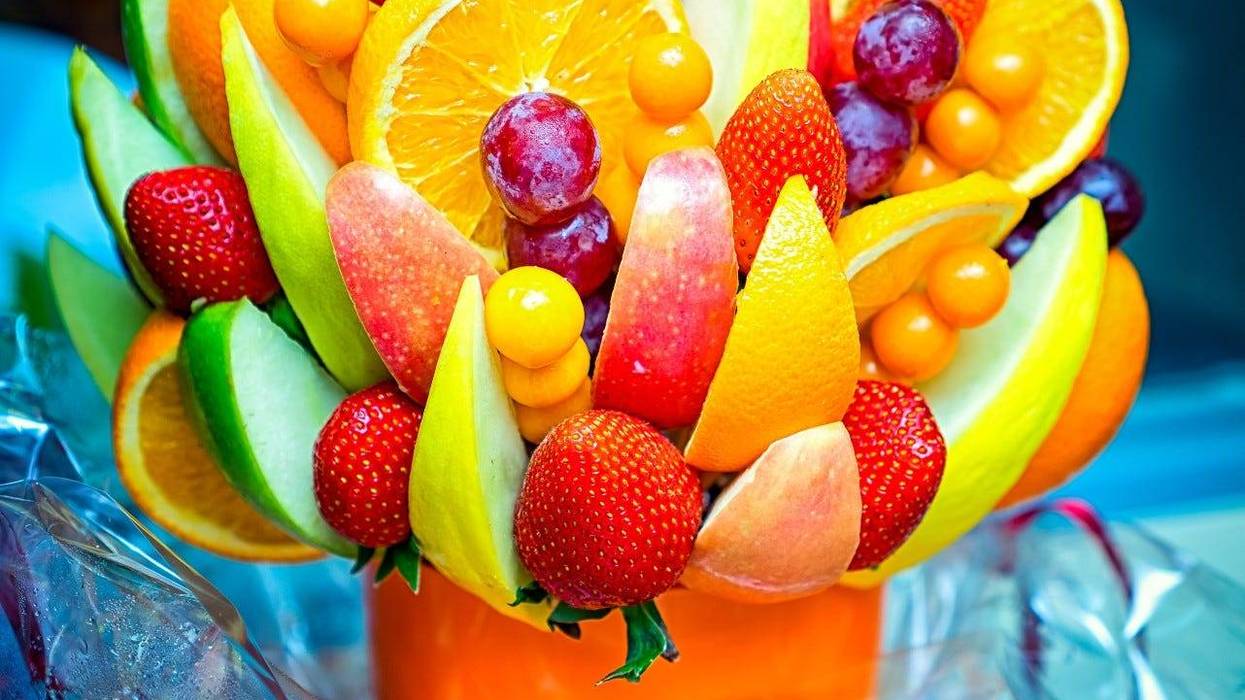 An Edible Arraignments delivery man had just finished dropping off a fruit bouquet on Saginaw's east side when deputies say he came under gunfire and was chased while driving on I-675 on Wednesday.
