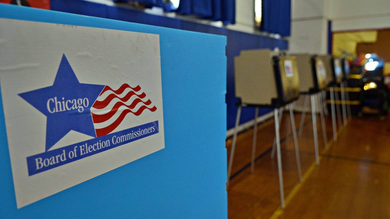 An election sign is seen as people cast their votes at a polling station during the election of mayor of Chicago and city council members in Chicago, United States on February 28, 2023.
