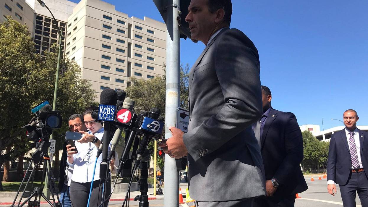 An emotional San Jose Mayor Sam Liccardo addresses the media outside the Valley Transportation Authority light rail yard, scene of a mass shooting, on Wednesday morning.
