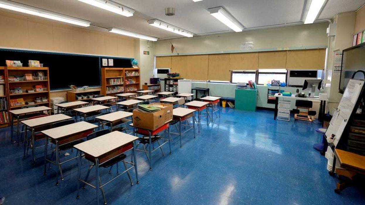 An empty classroom at Yung Wing School P.S. 124 shows that a teacher has prepared for the start of the school year on September 02, 2021 in New York City. All NYC public school students will return to in-person classes this month for the 2021-2022 school year, except for when COVID-positive kids must quarantine at home. Surveillance testing will be conducted every other week in each school building and will randomly test 10 percent of all students whose parents have consented.