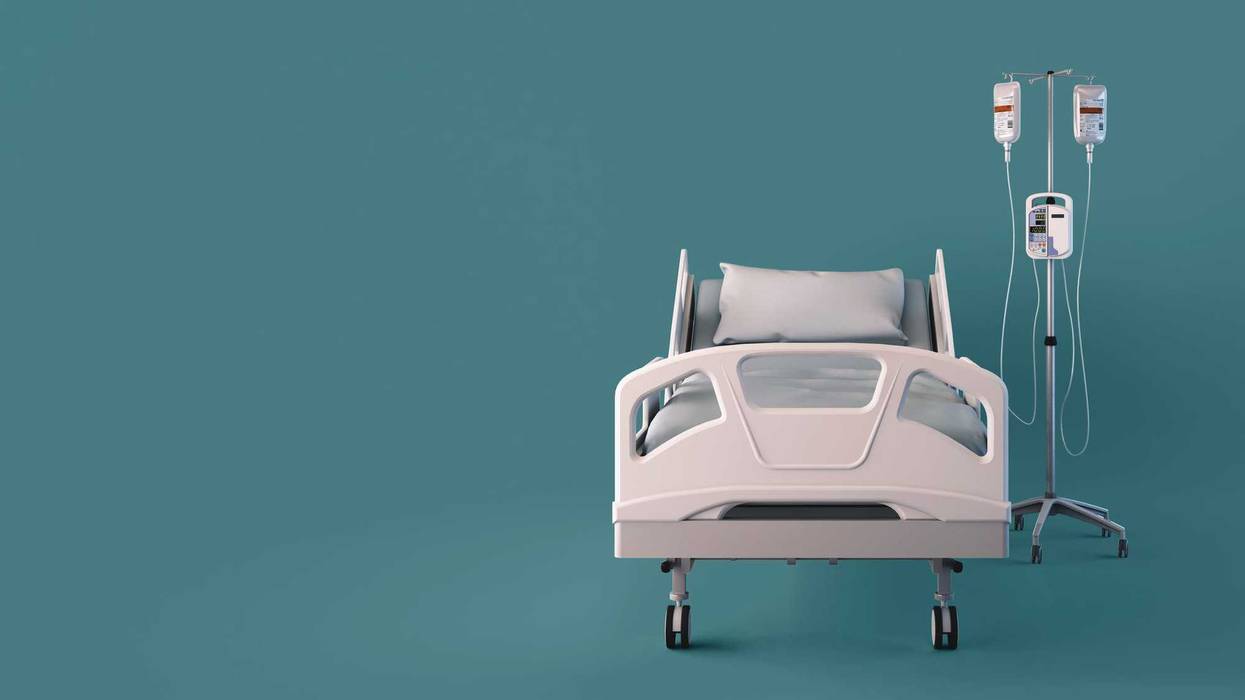 An empty hospital bed.