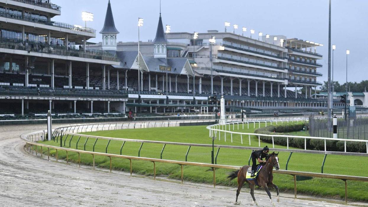 An exercise rider works Kentucky Derby entry Authentic at Churchill Downs.