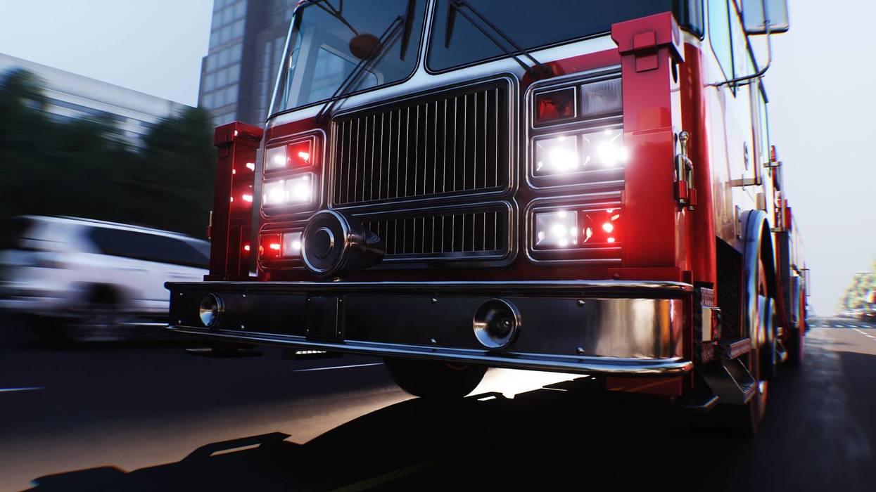 An fire engine, fire rescue driving fast on a city street.3d rendering.