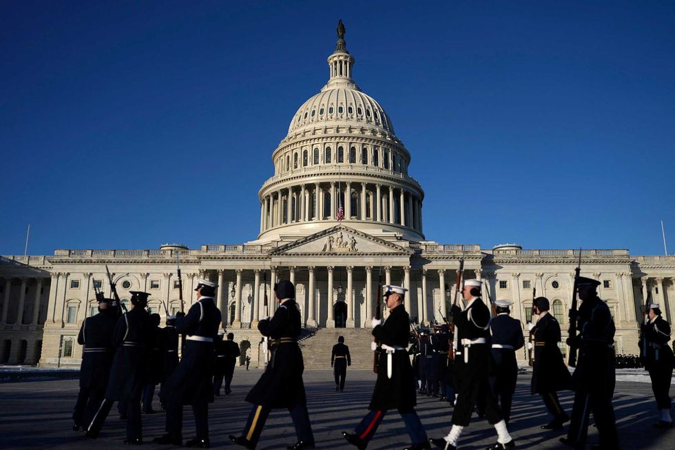 An Honor Guard prepares for the departure of the remains of former US President Jimmy Carter from the US Capitol for the State Funeral Service at the Washington National Cathedral in Washington, DC, on January 9, 2025