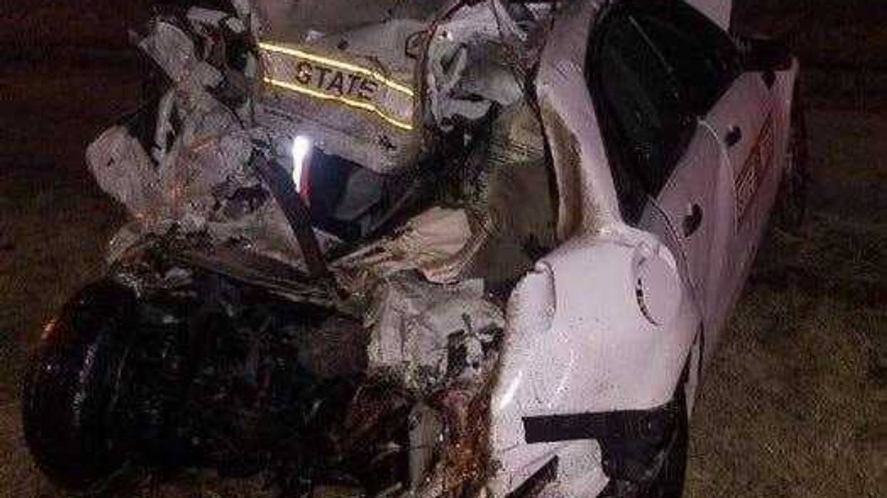 An Illinois State Police trooper was seriously injured when he and his squad car were hit by a semi Wednesday night in downstate Collinsville.