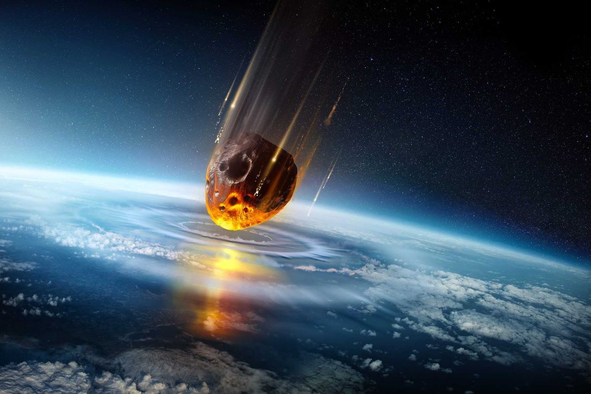 An illustration of an asteroid hitting the Earth.