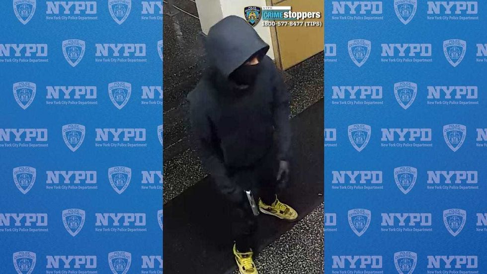An image from police shows one of the two suspects in the robbery pattern