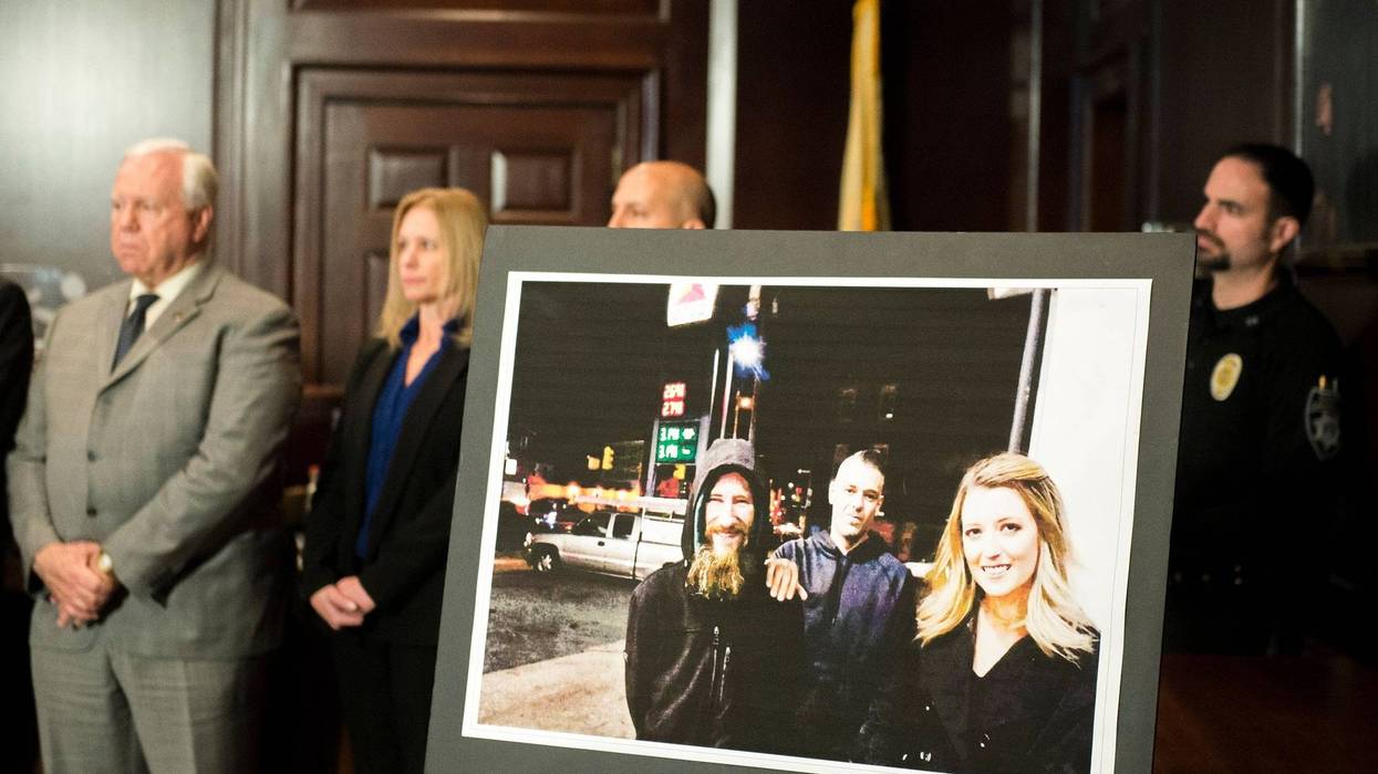 An image of Johnny Bobbitt Jr., from left, Mark D'Amico and Katelyn McClure on display during during a press conference Thursday, Nov. 15, 2018 in Mount Holly, N.J.