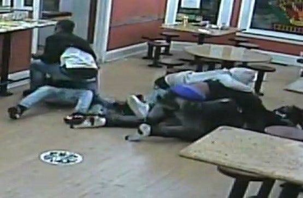 An image of the fight and struggle over a handgun that occurred inside the La Victoria Restaurant.