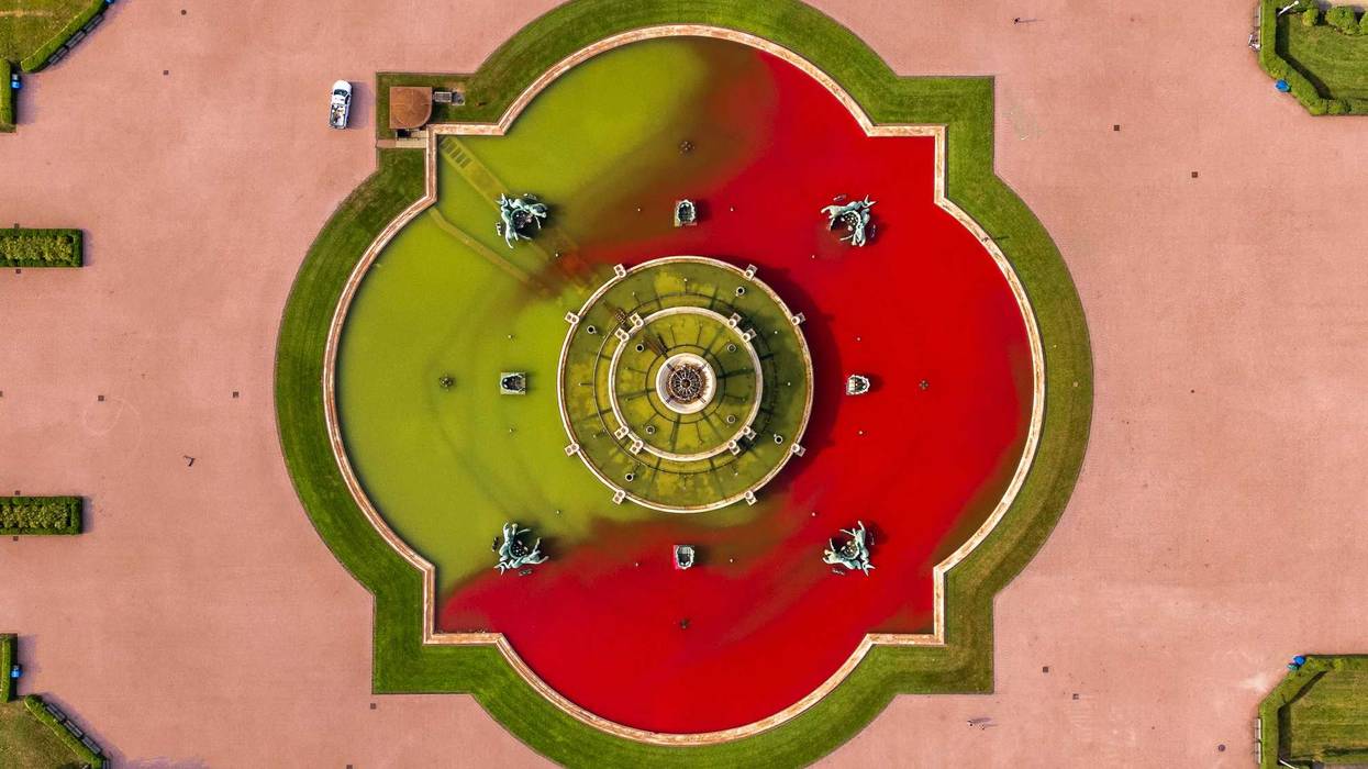 An image taken from a drone shows Buckingham Fountain on June 22, 2024, after demonstrators protesting the Israel-Hamas war vandalized the fountain and dyed its waters red.