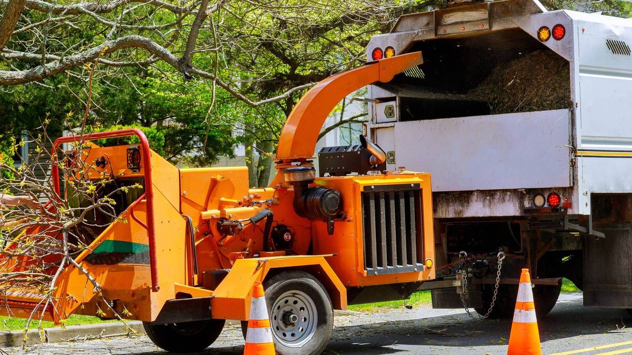 An incident involving a woodchipper sent one man to the hospital Thursday after he became trapped under the machine, police confirmed.