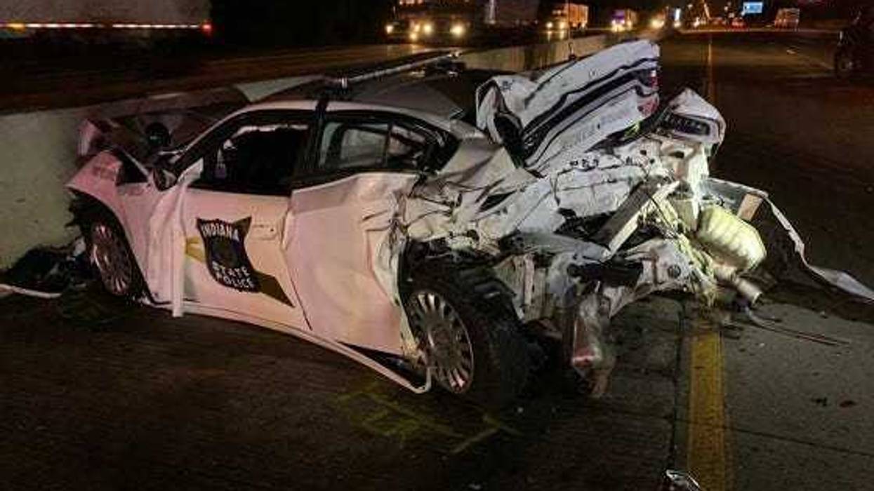 An Indiana State Trooper was injured Wednesday morning after his squad car was rear-ended while investigating a previous accident on I-80/94, police said.