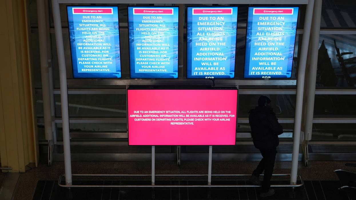An information board displays a message at Ronald Reagan Washington National Airport, Jan. 29, 2025, in Arlington, Va.