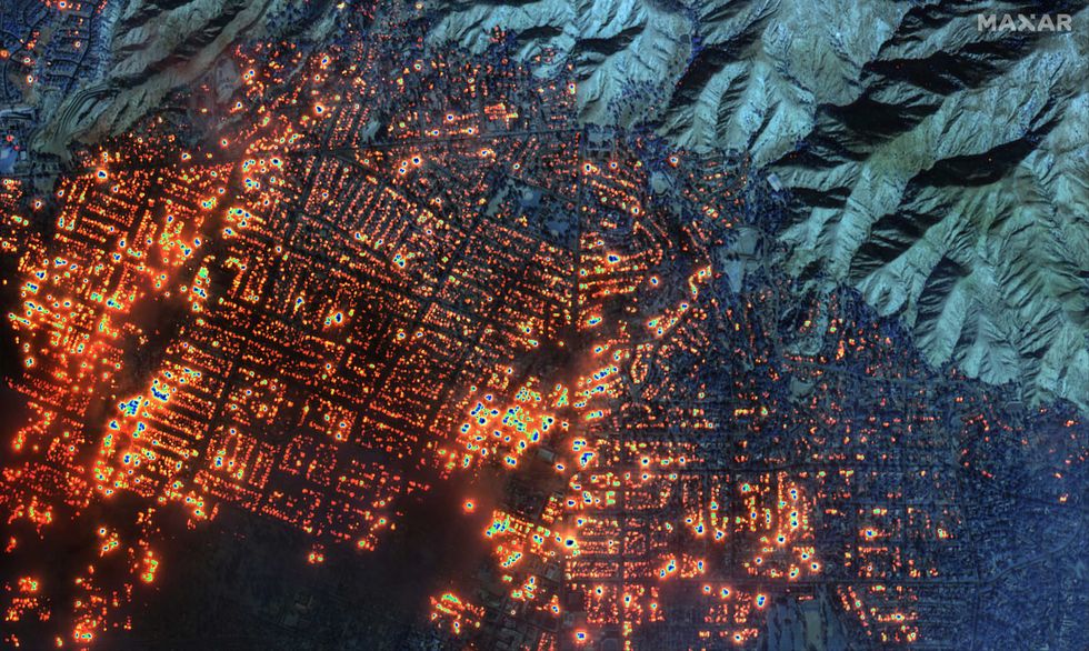 An infrared aerial image shows wildfires burning Wednesday in Altadena, Los Angeles County