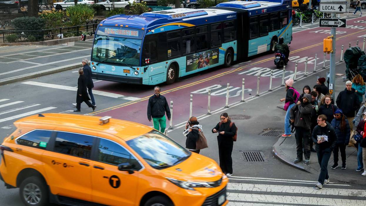 An MTA bus and a taxi in New York on Nov. 6.