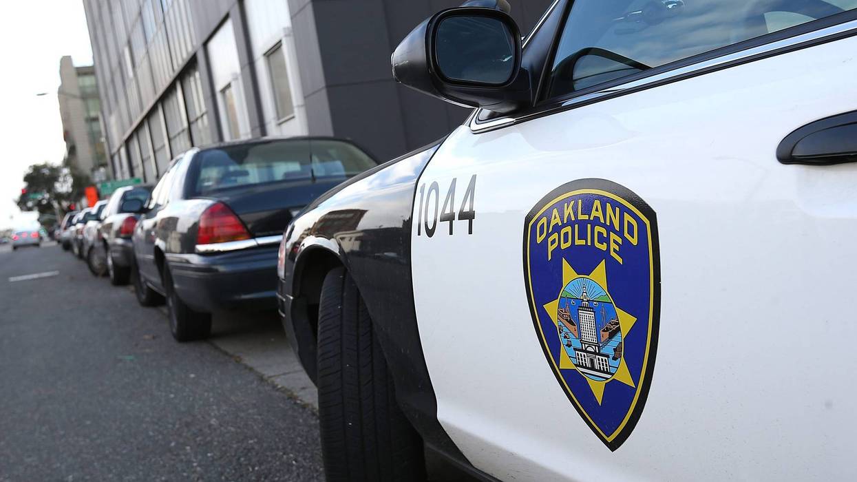 An Oakland Police patrol car sits in front of the Oakland Police headquarters on December 6, 2012 in Oakland, California.