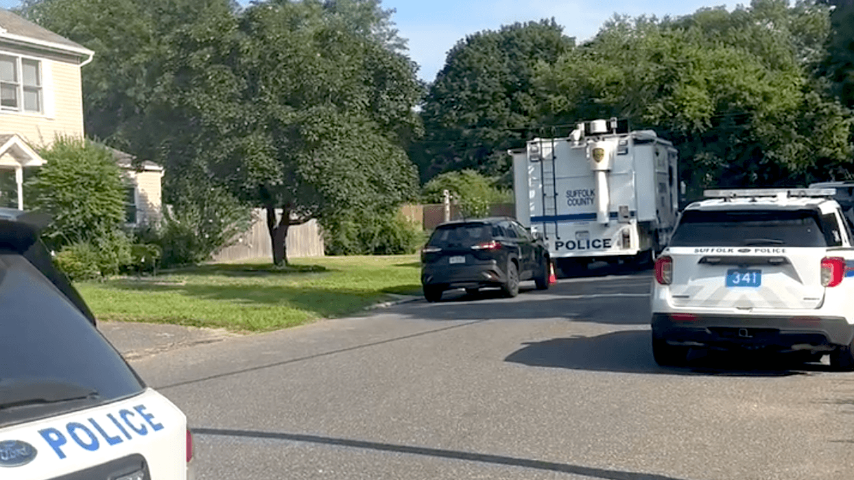 An officer was shot on New York Avenue in North Bay Shore as police investigated a body