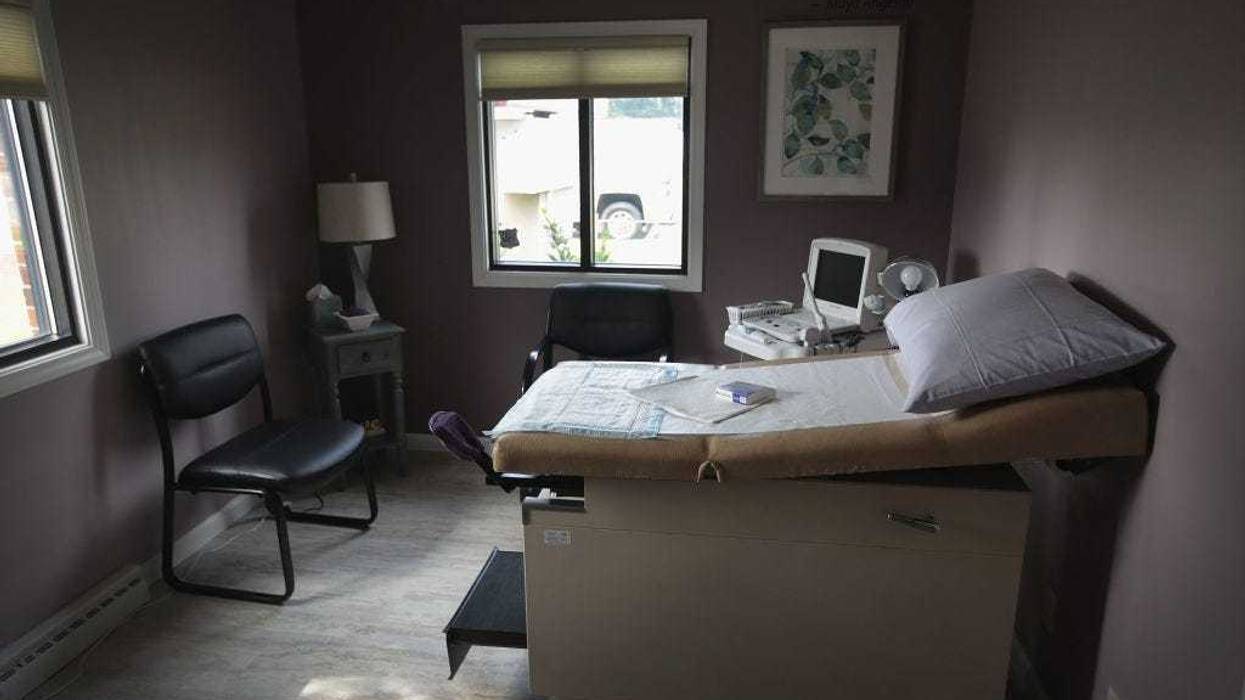 An ultrasound machine sits next to an exam table in an examination room at Whole Woman's Health of South Bend on June 19, 2019 in South Bend, Indiana. The clinic, which provides reproductive healthcare for women including providing abortions is scheduled to open next week following a nearly two-year court battle. Part of the Texas-based nonprofit Whole Woman's Health Alliance, the clinic will offer medication-induced abortions for women who are up to 10 weeks pregnant. (Photo by Scott Olson/Getty Images)
