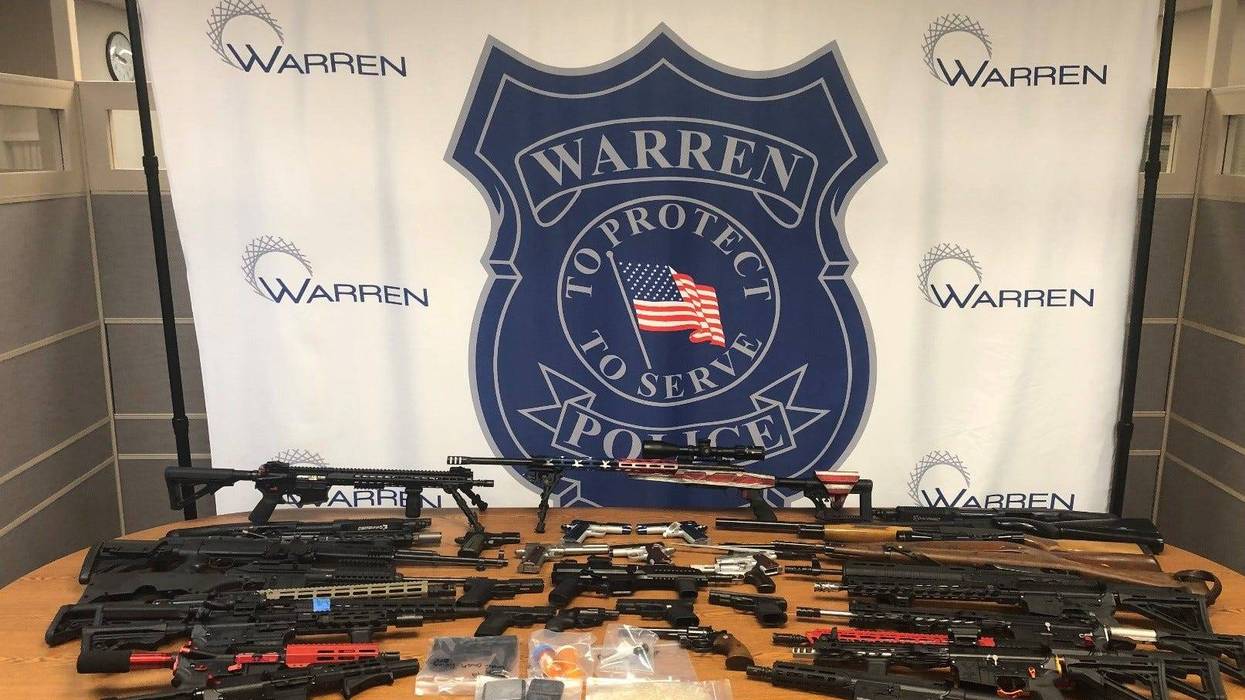 An undercover drug investigation by Warren police led to the seizure of a large amount of guns, ammunition and narcotics from a suspect's residence in Macomb County, authorities announced on Tuesday.