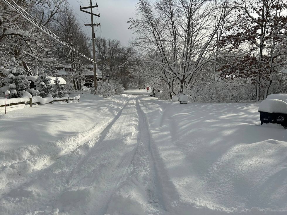 An unplowed road in Michigan City, Ind., on Saturday, after nearly 3 feet of snow fell.