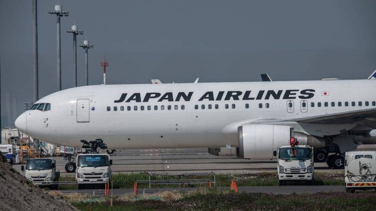 ANA (All Nippon Airways) and Japan Airlines aeroplanes sit unused at Haneda Airport on April 30, 2020 in Tokyo, Japan.