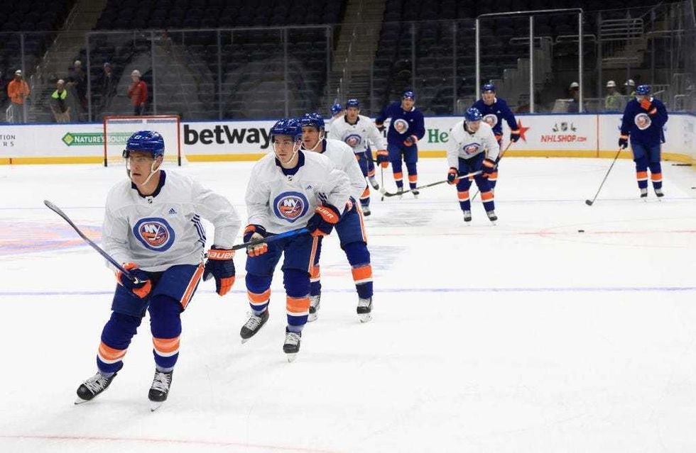 Anders Lee #27 of the New York Islanders leads the team in practice for the first time at their new $1.1 billion dollar rink which will debut Saturday night at UBS Arena on November 18, 2021 in Elmont, New York.