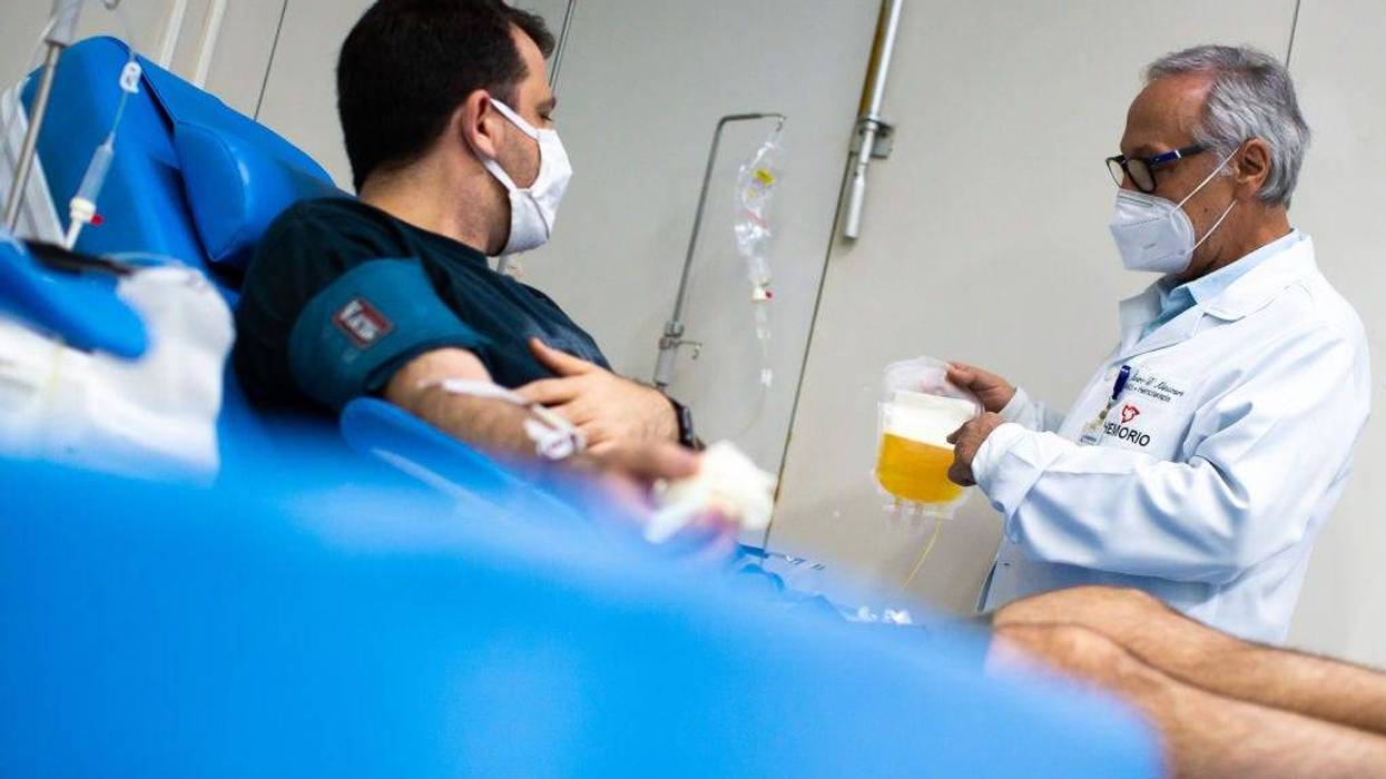 Andre Magalhaes, nurse, donates plasma through a process called plasmapheresis at Hemorio amidst the coronavirus (COVID-19) pandemic on June 5, 2020 in Rio de Janeiro, Brazil. Hemorio is one of the institutions that uses plasma transfusion technology, when the blood of patients that survived COVID-19 is utilized to strengthen the immunity of other victims infected by the virus. Hematologist Alvaro D'alincourt works at Hemorio on the front lines of fighting the virus, and is happy with the results of the transfusions. He claims two employees had the disease and responded very well to the use of plasma.