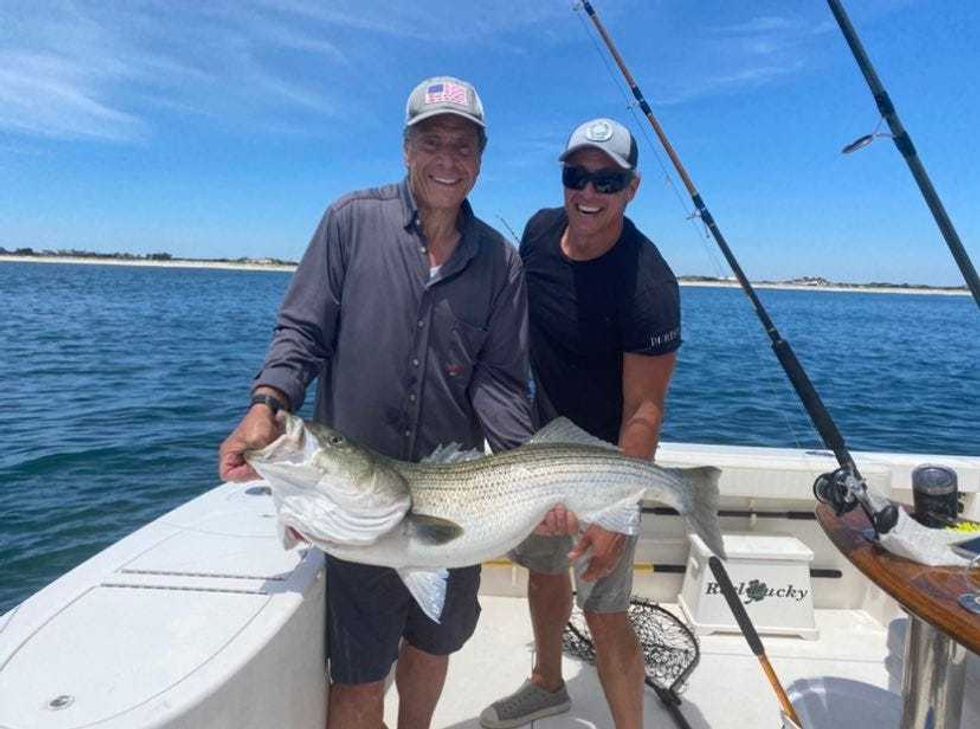 Andrew and Chris Cuomo fishing on Long Island in July