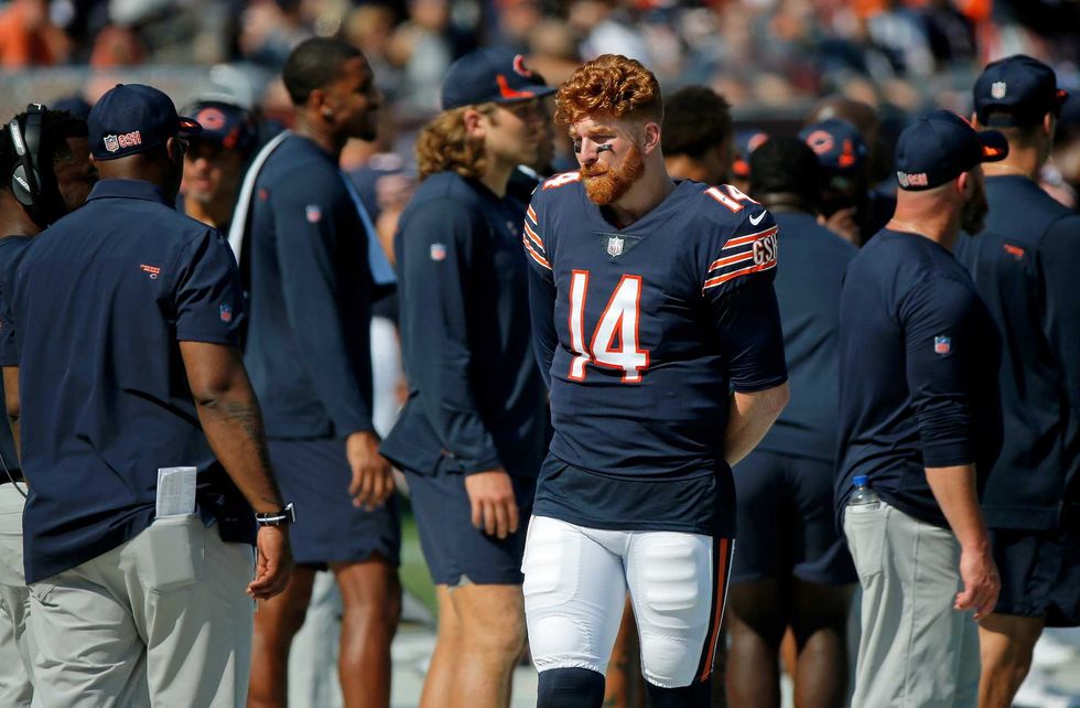 Andy Dalton roams the Bears sideline.