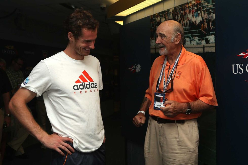 Andy Murray of Great Britain speaks with actor Sean Connery after his men