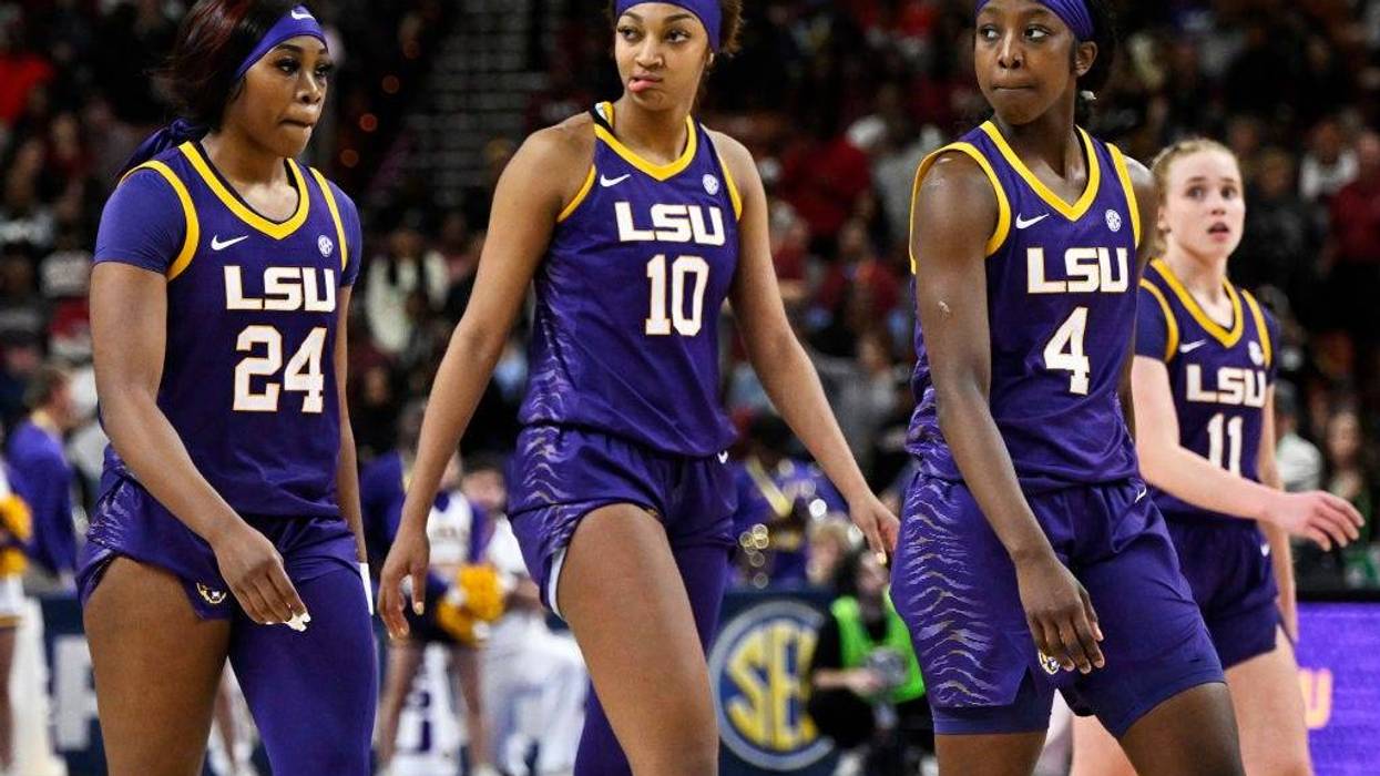 Aneesah Morrow #24, Angel Reese #10, Flau'jae Johnson #4, and Hailey Van Lith #11 of the LSU Lady Tigers stand on the court against the South Carolina Gamecocks in the fourth quarter during the championship game of the SEC Women's Basketball Tournament at Bon Secours Wellness Arena on March 10, 2024 in Greenville, South Carolina. (Photo by Eakin Howard/Getty Images)
