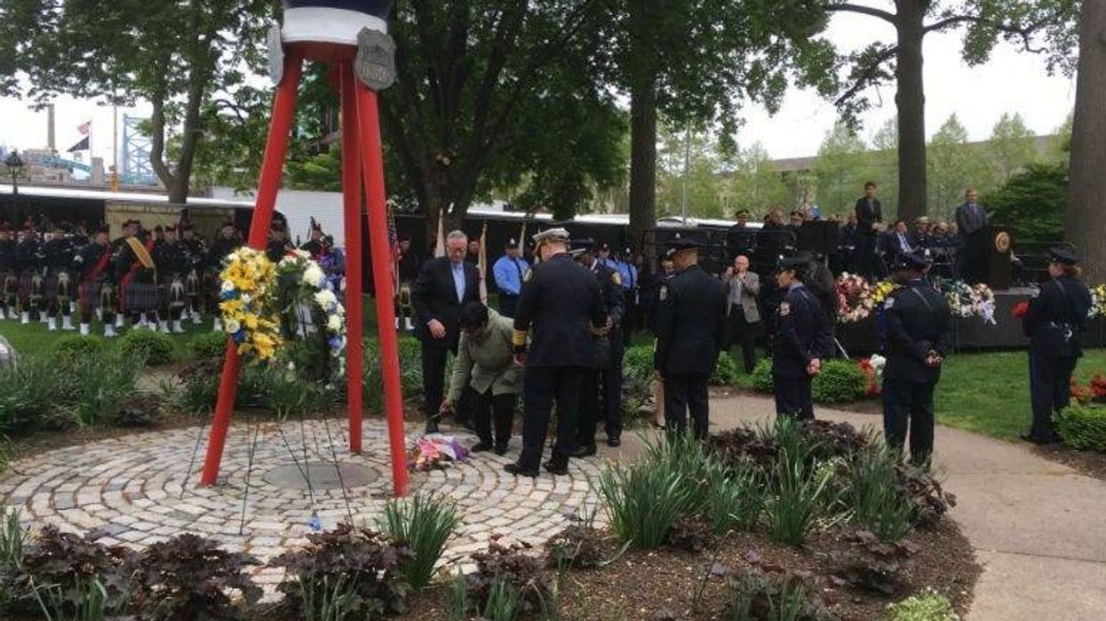 Another name is added to the Living Flame Memorial at Franklin Square Park as each year, the service honors police officers and firefighters who have died in the line of duty.