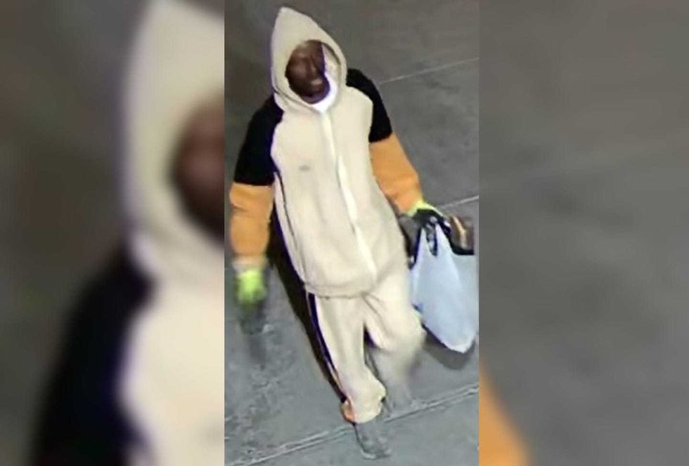 Another photo shows the suspect without his suit