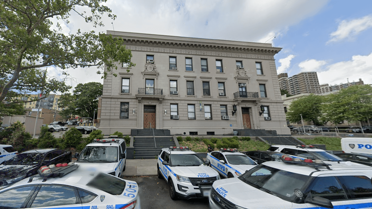 Anthony Sciortino, an NYPD detective assigned to the 120th Precinct on Staten Island (above) was arrested after a search warrant executed at his home Tuesday evening led to the discovery of a cache of illegal weapons.