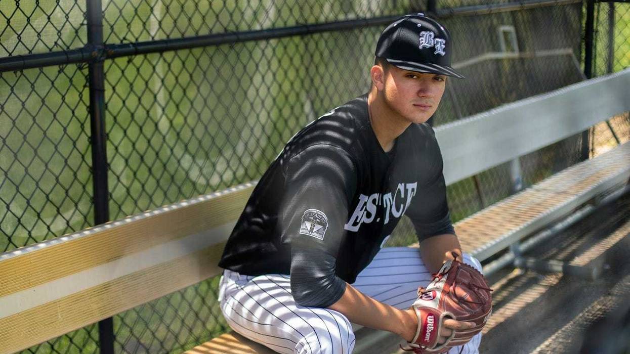 Anthony Solometo sitting on bench