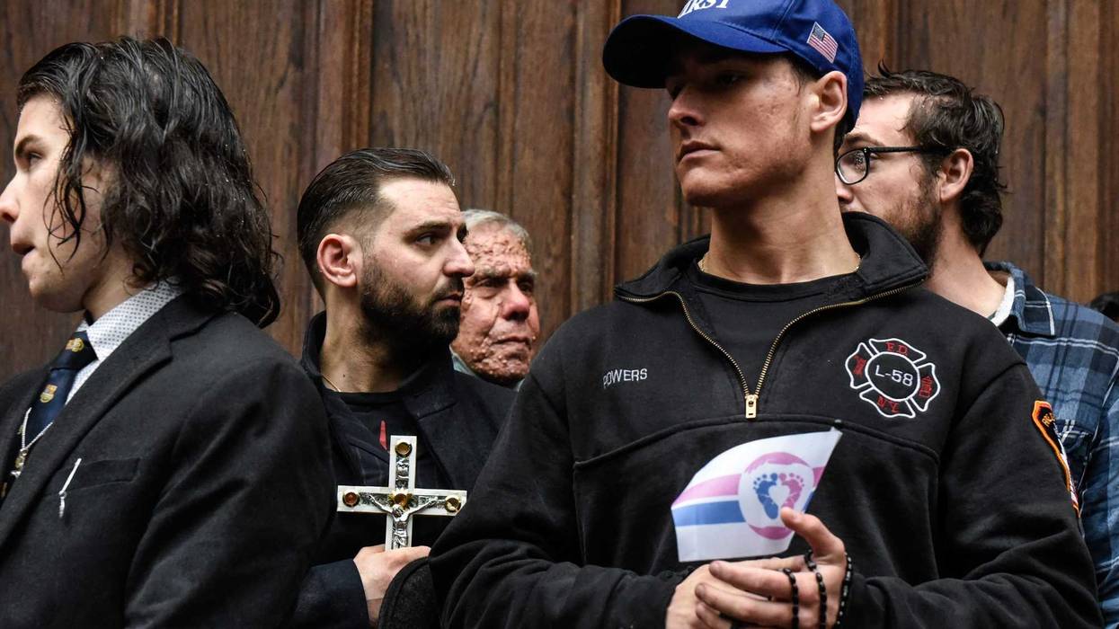 Anti-abortion activists and church members gather outside of Basilica of St. Patricks Old Cathedral in Nolita in Manhattan on May 7, 2022 Although the man is wearing an FDNY sweatshirt, he is not a member of the FDNY.