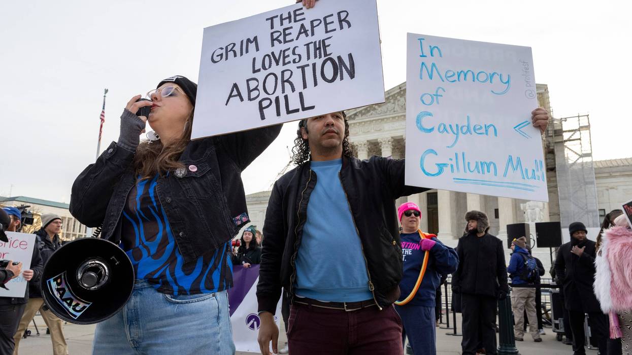 Anti-abortion protestors rally outside the Supreme Court.