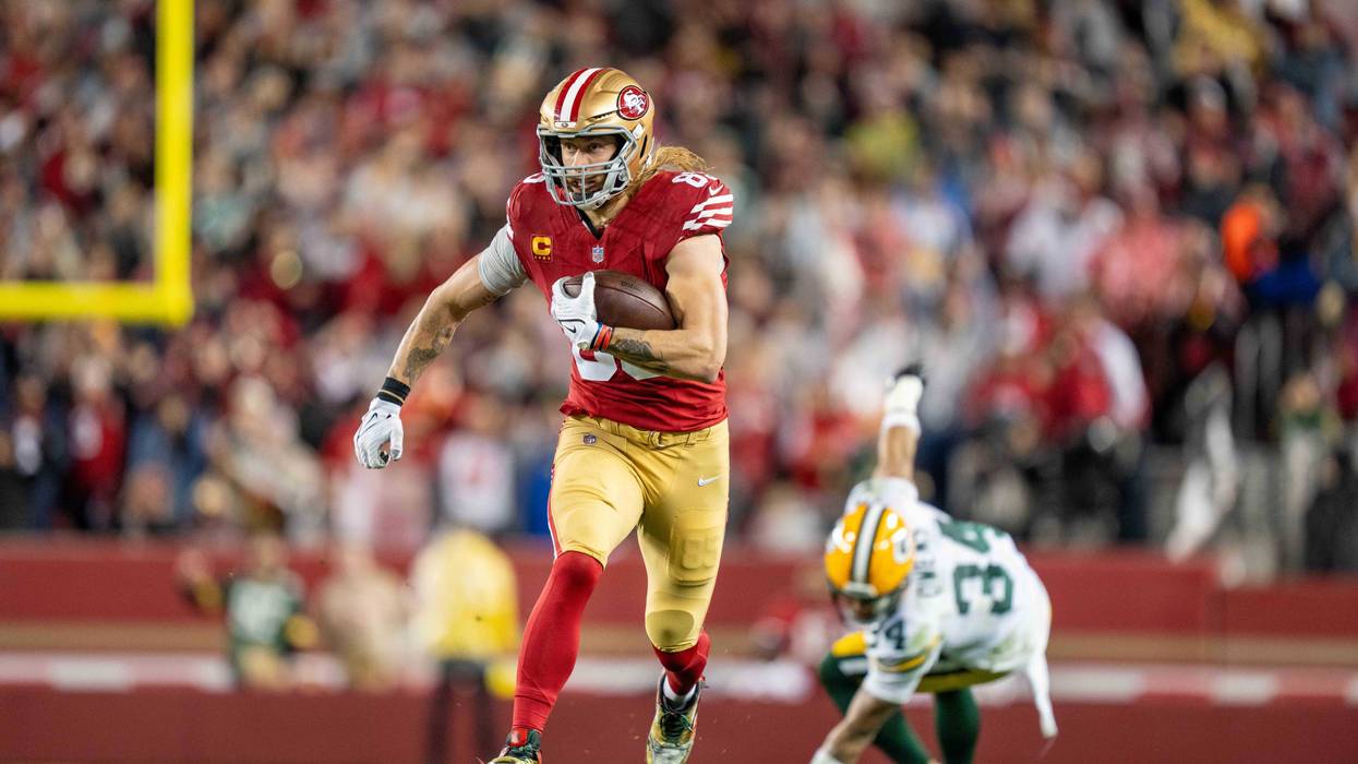 anuary 20, 2024; Santa Clara, CA, USA; San Francisco 49ers tight end George Kittle (85) runs against Green Bay Packers safety Jonathan Owens (34) during the third quarter in a 2024 NFC divisional round game at Levi's Stadium