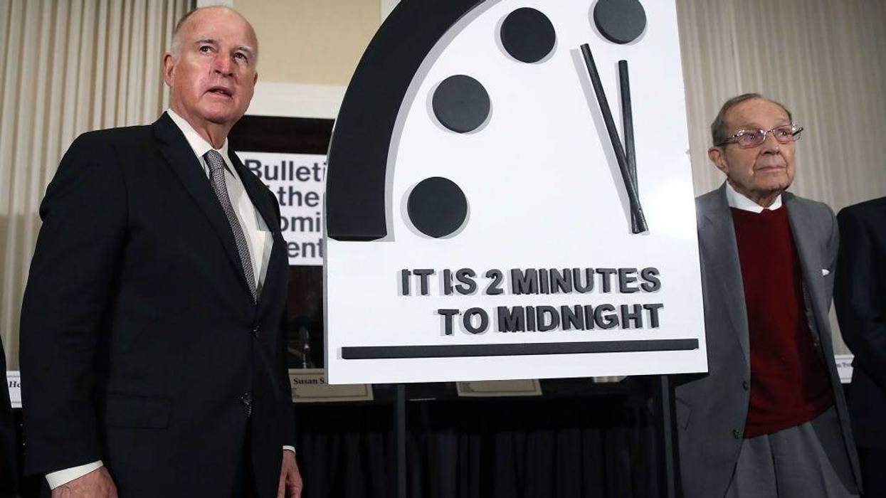 ANUARY 24: Former California Governor Jerry Brown, (L) and former U.S. Secretary of Defense William Perry unveil the Doomsday Clock during The Bulletin of the Atomic Scientists news conference, on January 24, 2019 in Washington, DC.