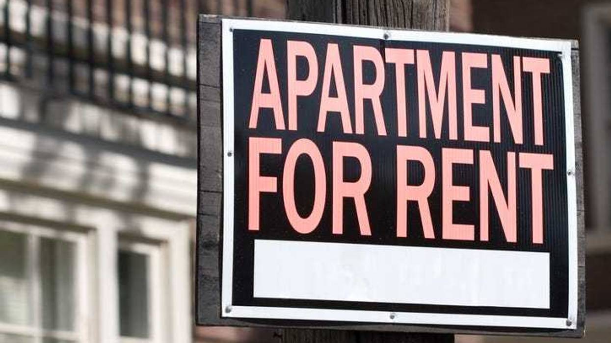 Apartment for rent sign.