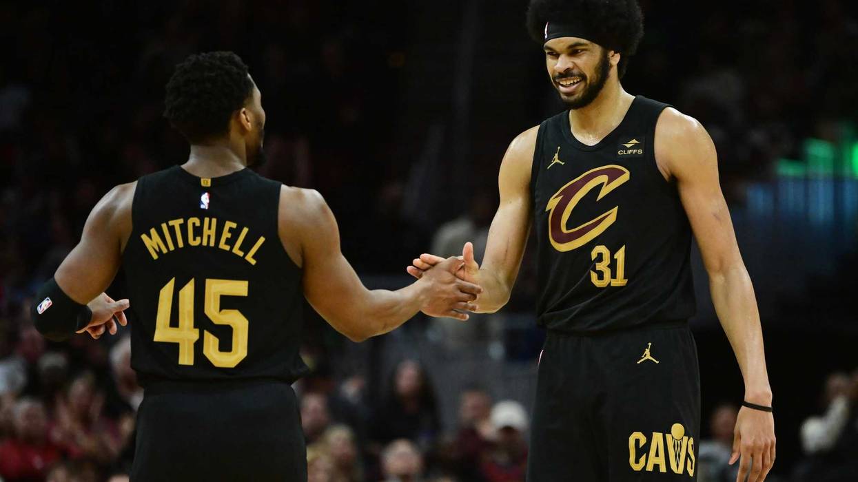 Apr 10, 2024; Cleveland, Ohio, USA; Cleveland Cavaliers guard Donovan Mitchell (45) and center Jarrett Allen (31) celebrate during the second half against the Memphis Grizzlies at Rocket Mortgage FieldHouse.