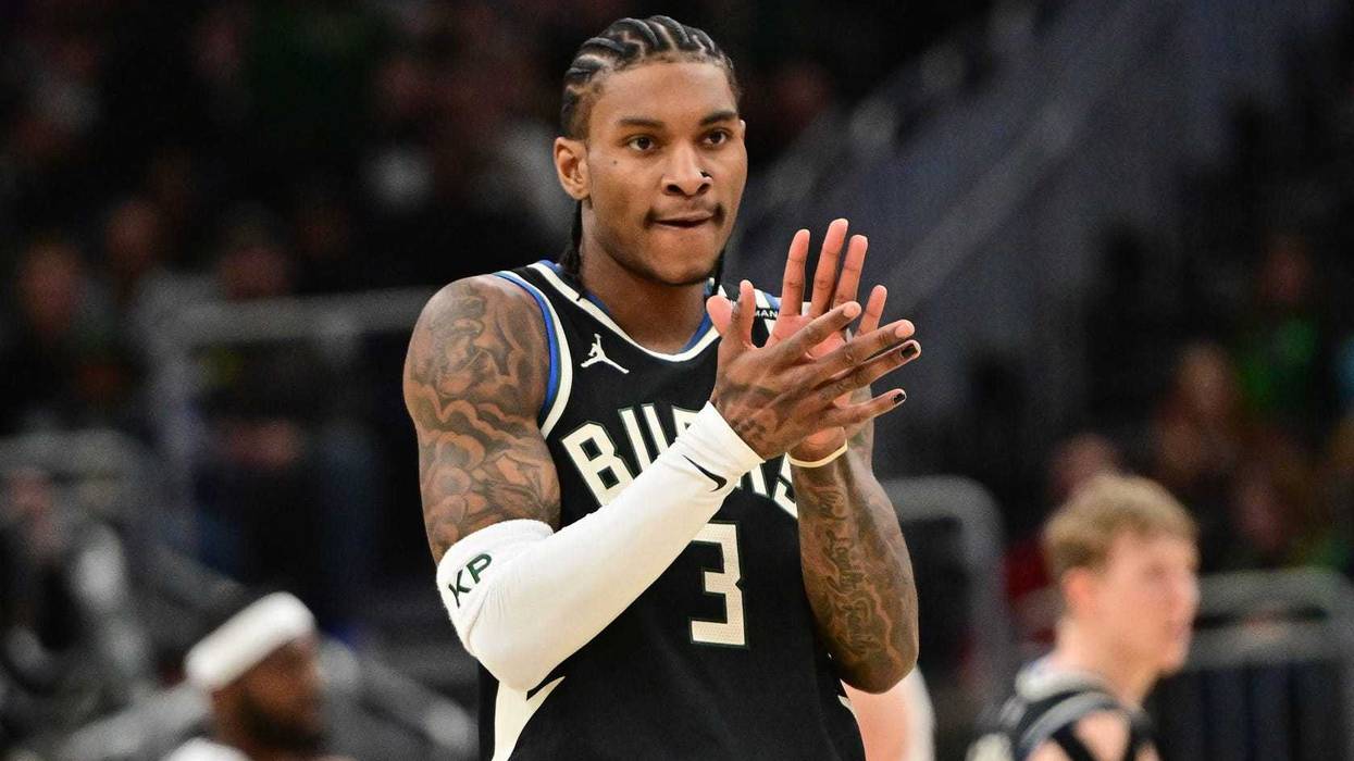 Apr 10, 2025; Milwaukee, Wisconsin, USA; Milwaukee Bucks guard Kevin Porter (3) reacts in the fourth quarter against the New Orleans Pelicans at Fiserv Forum. Mandatory Credit: Benny Sieu-Imagn Images