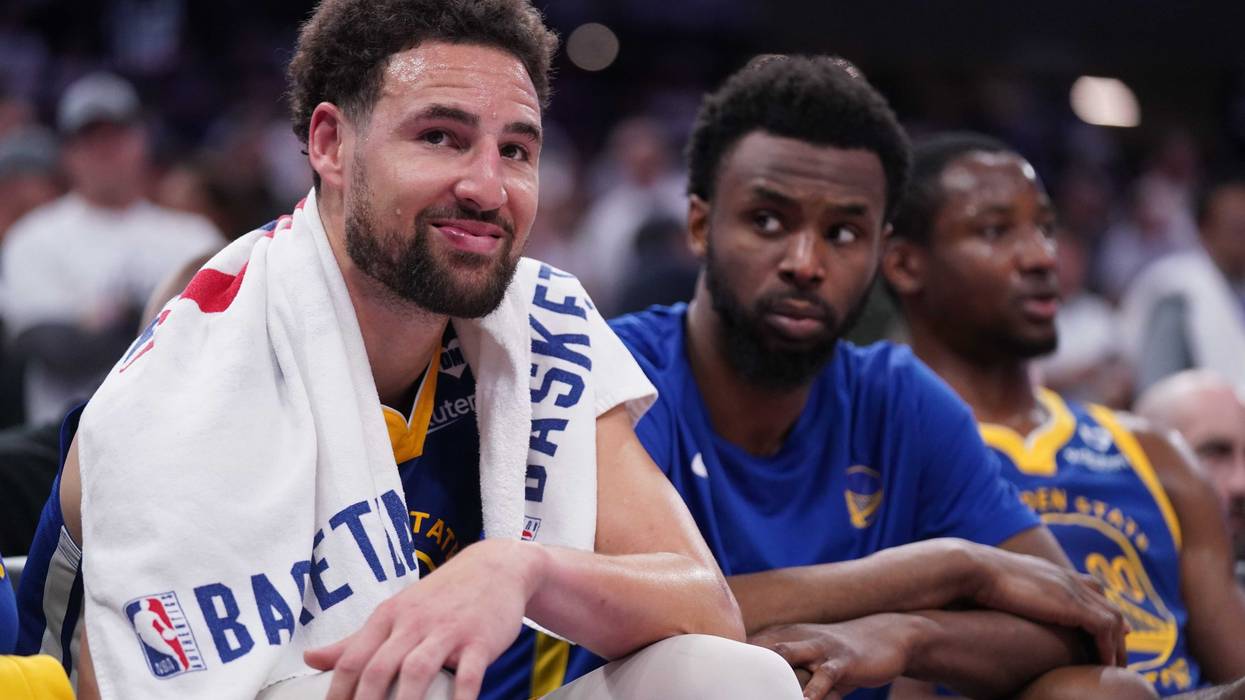 Apr 16, 2024; Sacramento, California, USA; Golden State Warriors guard Klay Thompson (11) sits on the bench during action against the Sacramento Kings in the fourth quarter during a play-in game of the 2024 NBA playoffs at the Golden 1 Center.