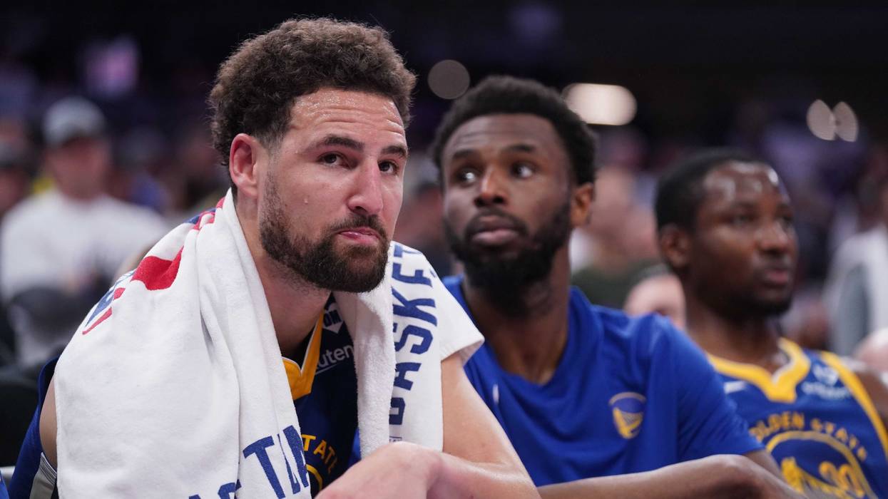 Apr 16, 2024; Sacramento, California, USA; Golden State Warriors guard Klay Thompson (11) sits on the bench during action against the Sacramento Kings in the fourth quarter during a play-in game of the 2024 NBA playoffs at the Golden 1 Center.