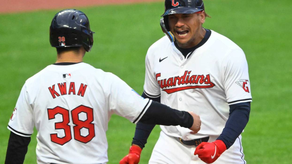 Apr 20, 2024; Cleveland, Ohio, USA; Cleveland Guardians designated hitter Josh Naylor (22) celebrates his two-run home run with left fielder Steven Kwan (38) in the fifth inning against the Oakland Athletics at Progressive Field.