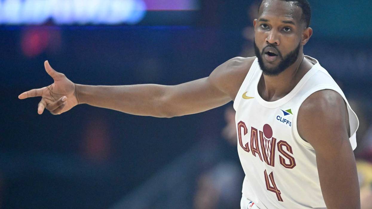 Apr 20, 2025; Cleveland, Ohio, USA; Cleveland Cavaliers forward Evan Mobley (4) celebrates his three-point basket in the first quarter against the Miami Heat at Rocket Arena.