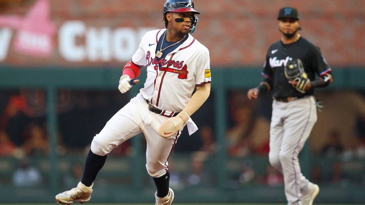 Apr 24, 2024; Atlanta, Georgia, USA; Atlanta Braves right fielder Ronald Acuna Jr. (13) steals second base against the Miami Marlins in the first inning at Truist Park. Mandatory Credit: Brett Davis-Imagn Images
