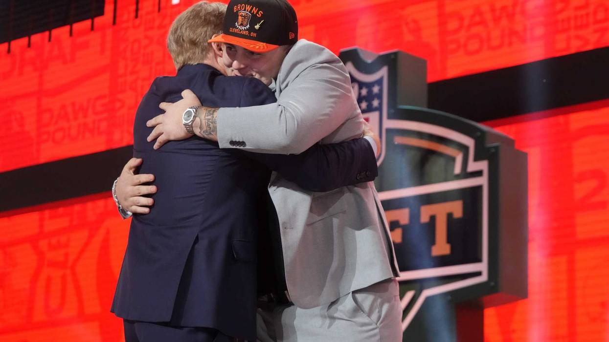 Apr 24, 2025; Green Bay, WI, USA; NFL commissioner Roger Goodell with Michigan Wolverines defensive lineman Mason Graham after he is selected by the Cleveland Browns as the number five pick in the first round of the 2025 NFL Draft at Lambeau Field.